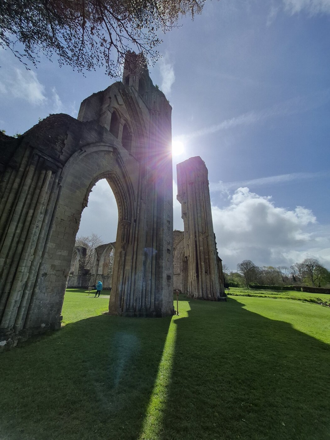 Sunlight through ancient abbey ruins